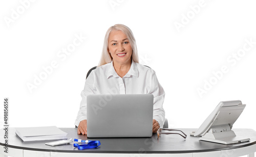 Mature businesswoman workin...