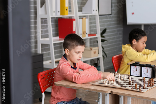 Little children playing che...