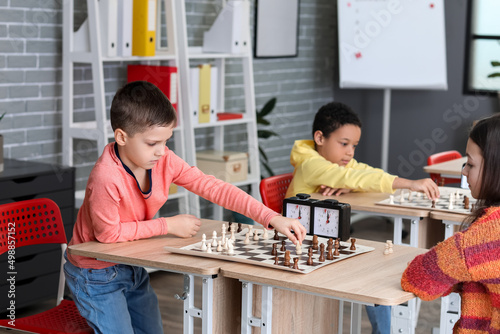 Little children playing che...