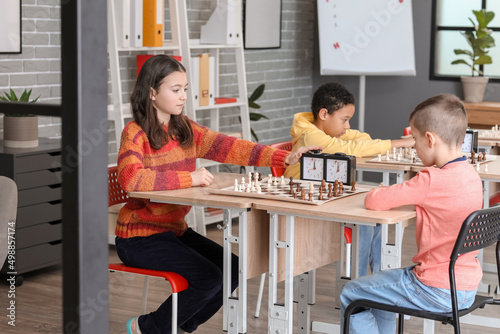 Little children playing che...
