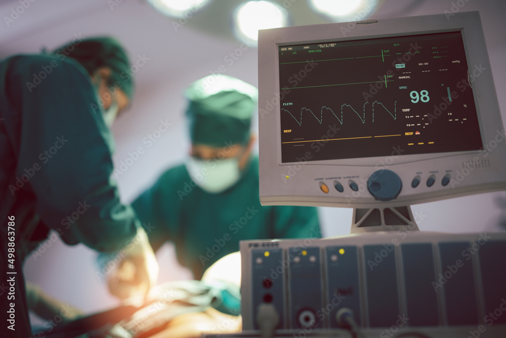 Monitor screen for a medical defibrillator or emergency heart pump, showing vital signs, heart