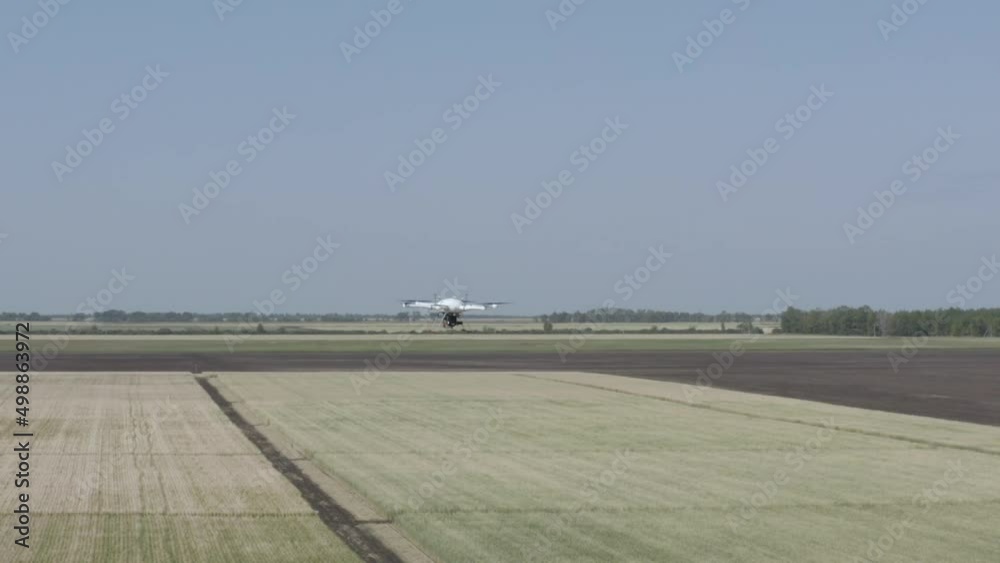 This stock video shows a drone taking off over agricultural fields. This video will decorate your projects related to agriculture, nature, aerial photography. This stock video shows a drone taking off over agricultural fields. This video will decorate your projects related to agriculture, nature, aerial photography.