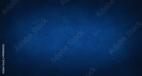Abstract blue watercolor background with paper texture  vintage watercolor paint splash and stains in elegant dark blue