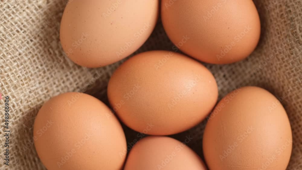 Chicken egg, rotation shot, Chicken fresh raw eggs.Healthy fresh food ingredients for breakfast. Animal products. Grocery. Chicken farm fresh eggs