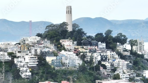 4K Aerial San Francisco cityscape with white historic building of Coit Tower USA photo