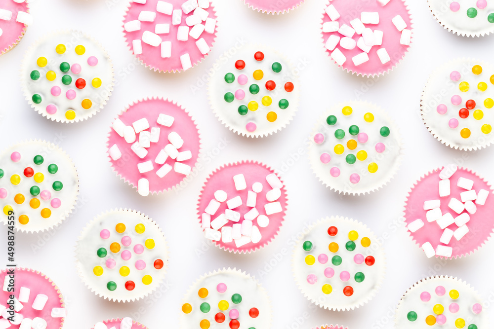 Colorful cupcakes on a white background. Colorful cupcakes on a white background.