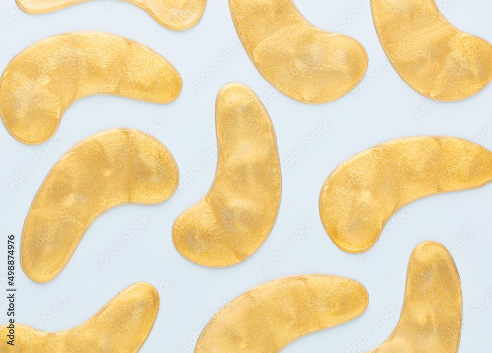 Gold hydrogel eye patches background. Gold hydrogel eye patches background.