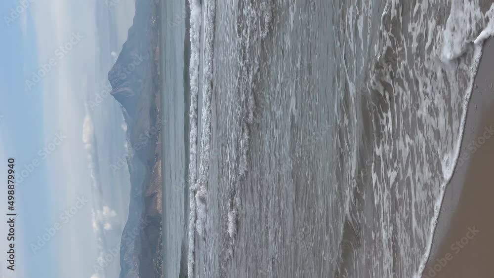 Sea and mountains view from the beach in Alicante, Spain. Vertical video Sea and mountains view from the beach in Alicante, Spain. Vertical video