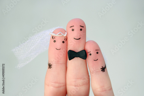 Fingers art of Happy couple to get married. Concept of stepson is joy about wedding. photo