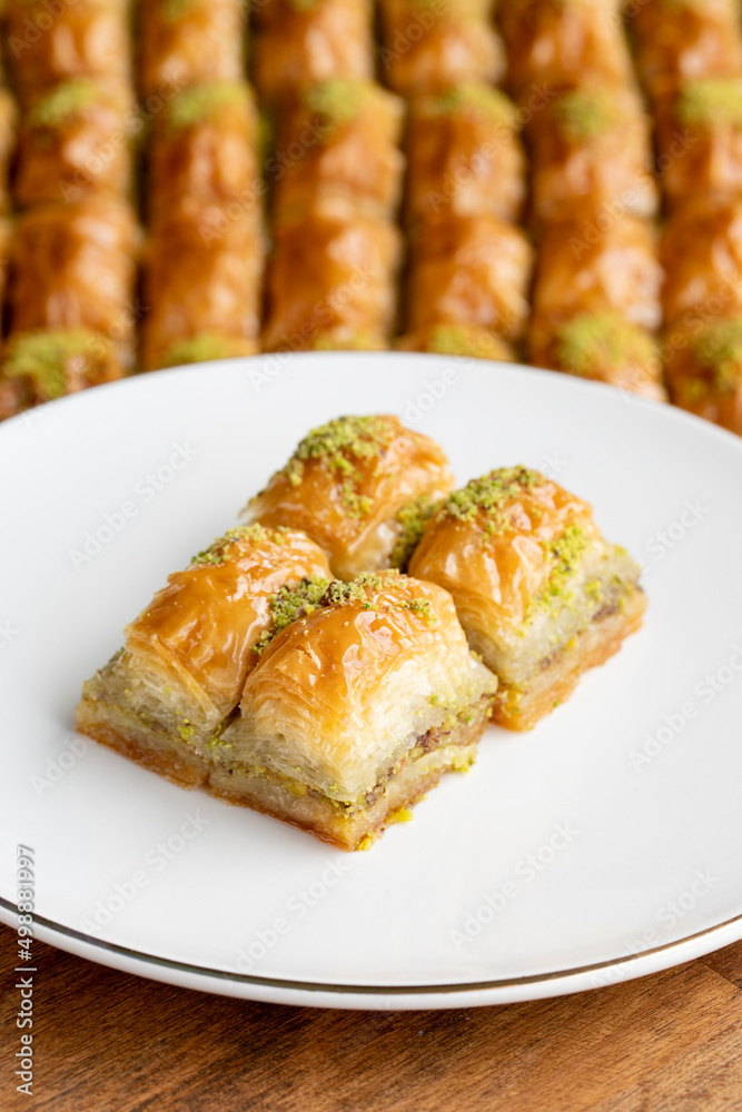 Pistachio baklava. Pistachio baklava in plate. Traditional middle eastern cuisine flavors. Close-up.