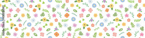 かわいい手描き春の草花柄模様のシームレス背景