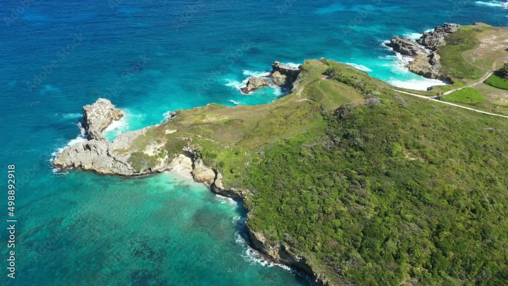Macao beach with turquoise water and stone cliff. Dominican Republic. Aerial Pristine and bounty view Macao beach with turquoise water and stone cliff. Dominican Republic. Aerial Pristine and bounty view