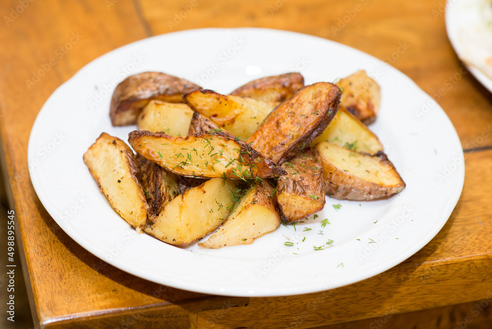 Fried potato pieces on a plate