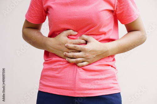 Woman suffer from stomachacheChronic gastritis Abdomen bloating concept