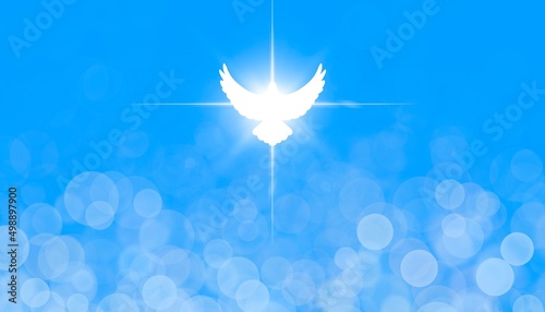 Banner Pentecoste colomba bianca pasquale luce raggiante bianca sfondo azzurro  photo