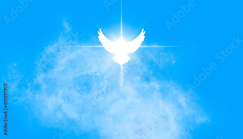 Colomba bianca di Pentecoste croce raggiante luce sfondo azzurro  photo