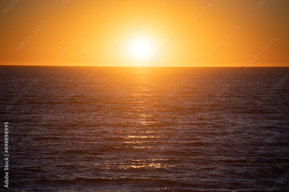 Calm sunset at the sea. landscape with sunset over the ocean. Calm sea. Panorama on sea at sunset. Beautiful seascape. Composition of nature.