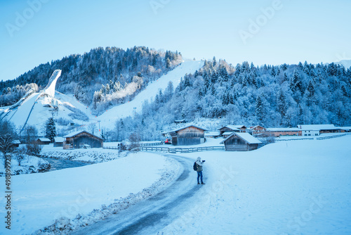 wooden house in the forest winter with snow