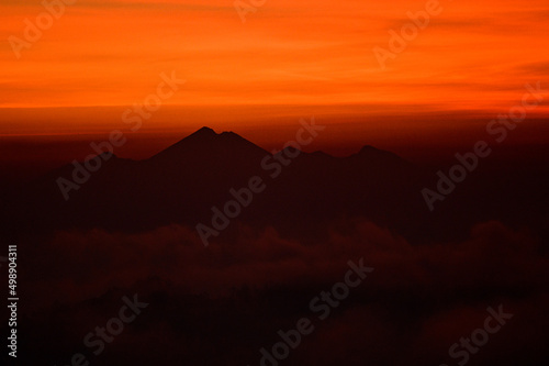 Sunrise on the island of Bali  Indonesia as viewed during the dawn ascent up the Mt. Batur volcano.