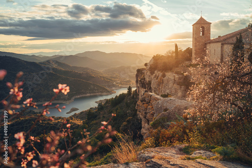 Fototapeta Naklejka Na Ścianę i Meble -  sunset old town on the hill