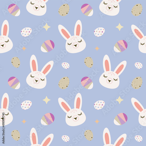 Seamless vector pattern with cute white rabbits with eggs. Perfect for textile  wallpaper or print design.
