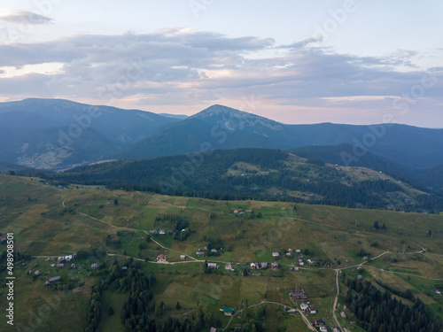 Sunset over the mountains in the Ukrainian Carpathians. Evening. Aerial drone view.