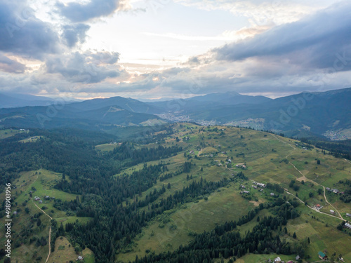 Green Ukrainian Carpathians mountains in summer. Aerial drone view.