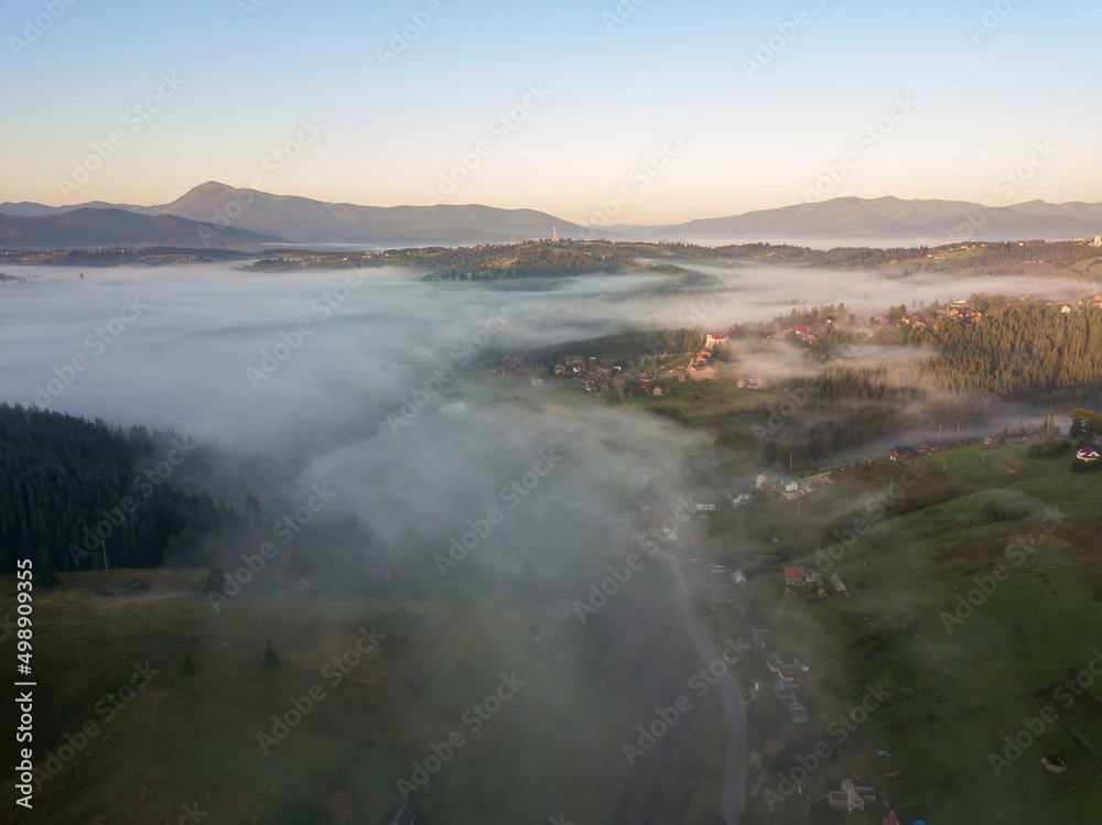 Morning fog in the Ukrainian Carpathians. Aerial drone view. Morning fog in the Ukrainian Carpathians. Aerial drone view.