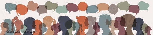Communication between people of diverse cultures. Group of multicultural people talking. Crowd talking. Colored silhouette of side of various mixed race people. Speech bubble. Diversity