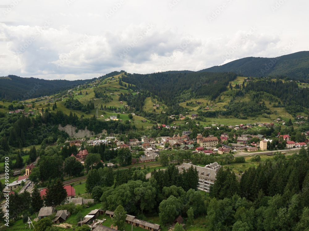 Settlement in the mountains of the Ukrainian Carpathians. Aerial drone view. Settlement in the mountains of the Ukrainian Carpathians. Aerial drone view.