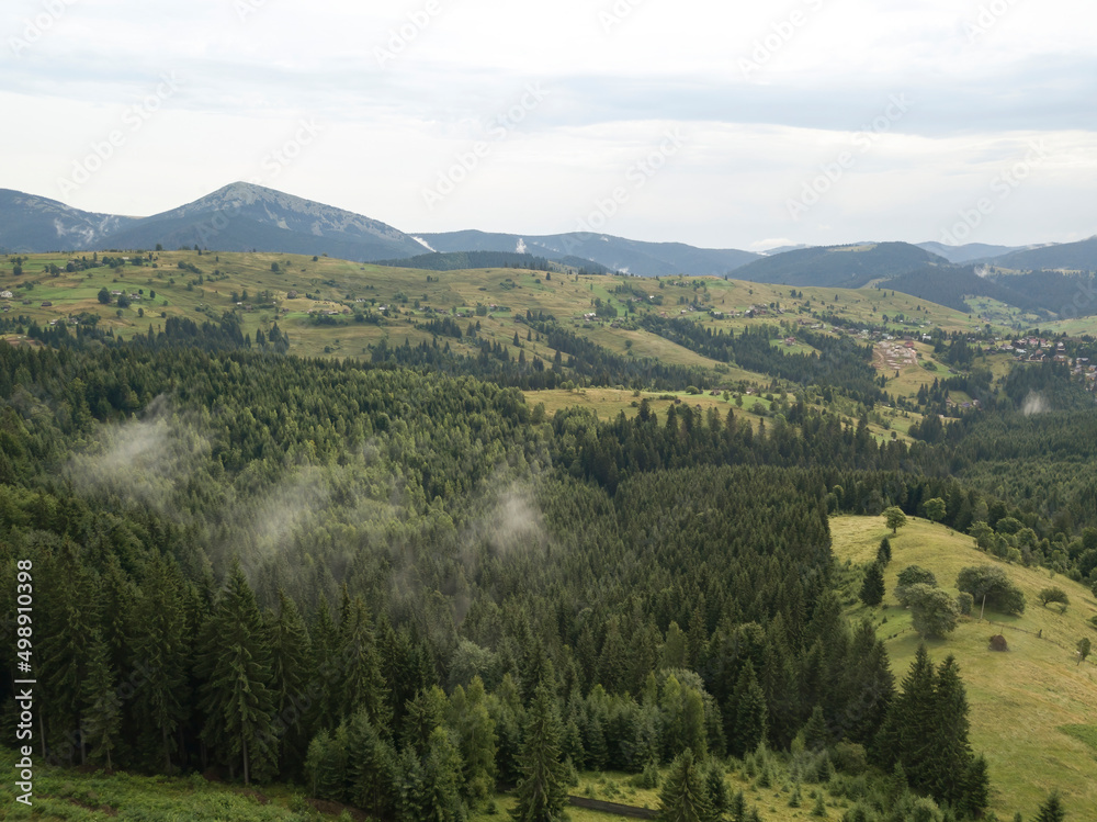 Green mountains of Ukrainian Carpathians in summer. Aerial drone view. Green mountains of Ukrainian Carpathians in summer. Aerial drone view.