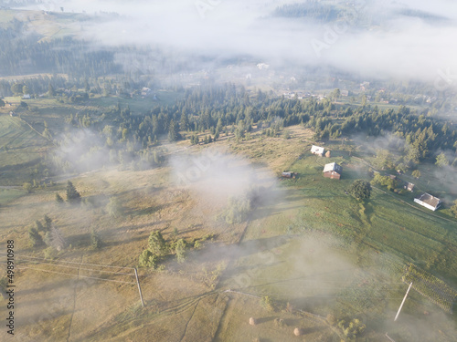 Morning fog in the Ukrainian Carpathians. Aerial drone view.