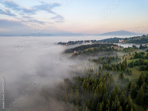 Morning fog in the Ukrainian Carpathians. Aerial drone view.