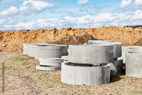 Reinforced concrete rings for the installation of underground wells at the construction site. Reinforced concrete products for the device of underground communications. Sewerage and plumbing.