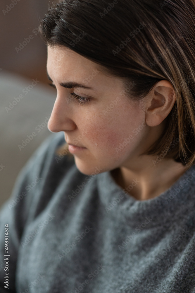 mental health, psychological problem and depression concept - close up of sad crying woman at home mental health, psychological problem and depression concept - close up of sad crying woman at home