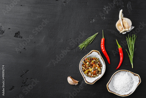 Fototapeta Naklejka Na Ścianę i Meble -  Flat lay composition with chili peppers and spices