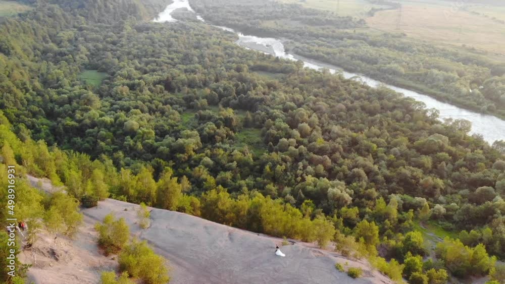 Incredible nature. River and forests in the mountains on a warm summer sunny evening