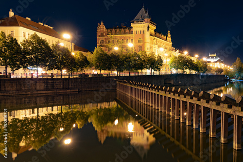 Historical buildings at Smetana Embankment by night