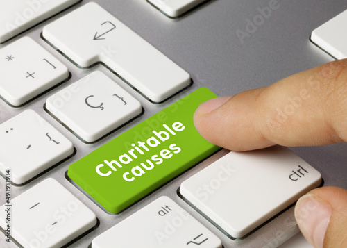 Charitable causes - Inscription on Green Keyboard Key.