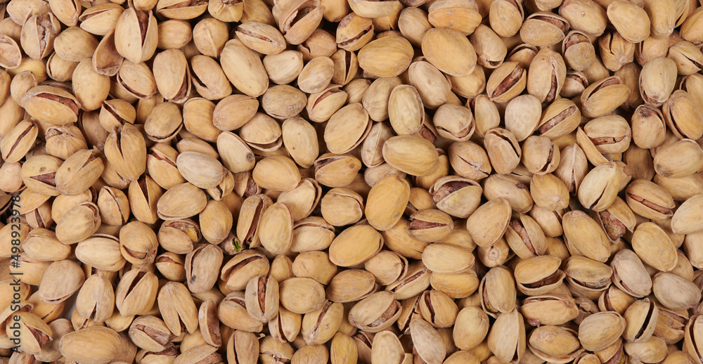 a lot of salted pistachios texture background a lot of salted pistachios texture background