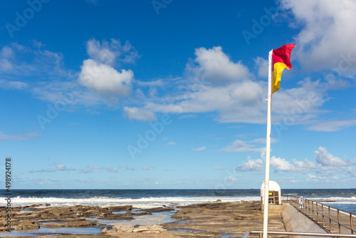 lifeguard flag on the beach © Christina
