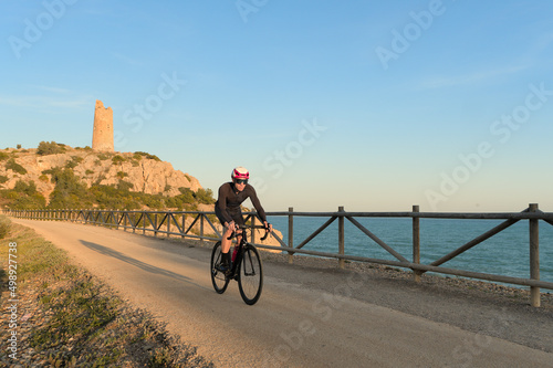 Cycling training on a route by the sea