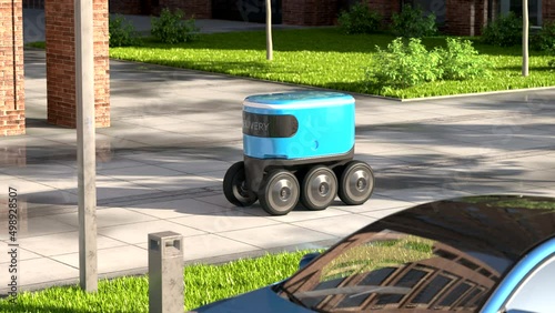 Autonomous delivery robot drives along the street