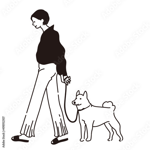犬の散歩をしている女性のベクター線画