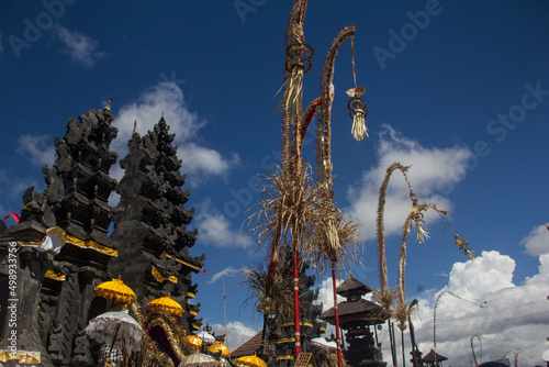 Temple gate with penjor decoration photo