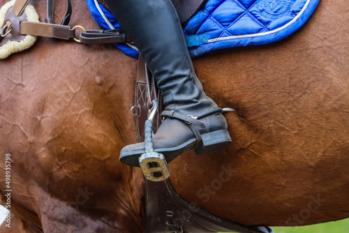 Horse riding leg spurs close-up photo