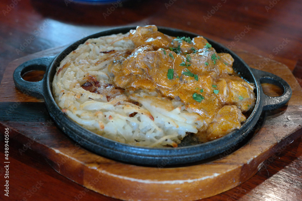 Rosti is a Swiss dish consisting mainly of potatoes, pan-fried or deep-fried Rosti is a Swiss dish consisting mainly of potatoes, pan-fried or deep-fried