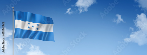 Honduras flag isolated on a blue sky. Horizontal banner