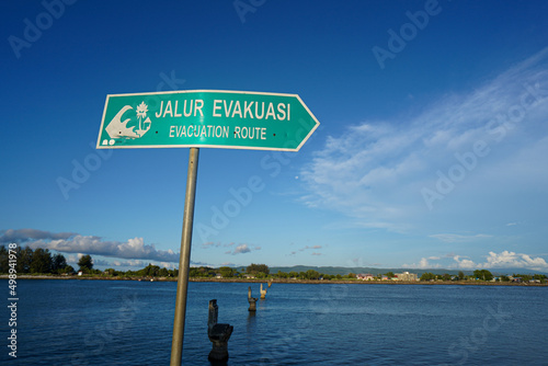 Disaster evacuation route pamphlet on the beach.