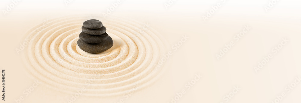 Naklejka premium Zen japanese garden and black stones background. Horizontal banner